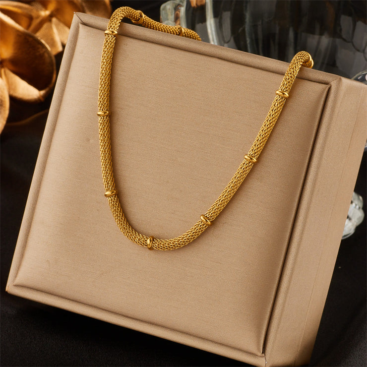 Elegant and niche design, hollowed out cylindrical chain, gold bead tassel pendant, titanium steel jewelry necklace