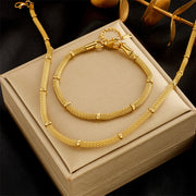 Elegant and niche design, hollowed out cylindrical chain, gold bead tassel pendant, titanium steel jewelry necklace