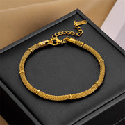 Elegant and niche design, hollowed out cylindrical chain, gold bead tassel pendant, titanium steel jewelry necklace